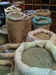 Green Coffee Beans in Burlap bags before roasting single origin coffees